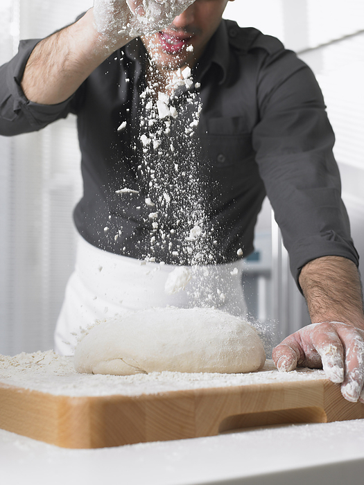 Man Baking, by Masterfile / Design Pics