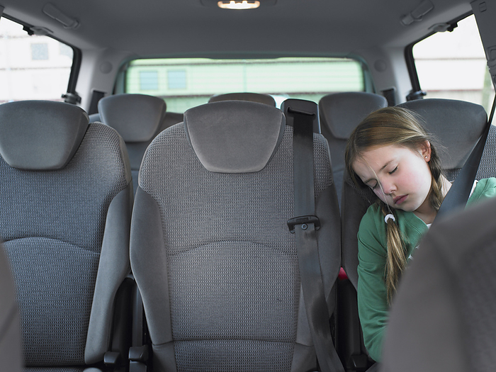 Girl Sleeping in Car, by Masterfile / Design Pics