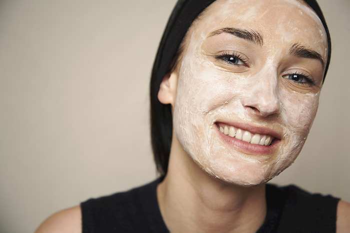 Woman with Facial Mud Mask, by Masterfile / Design Pics