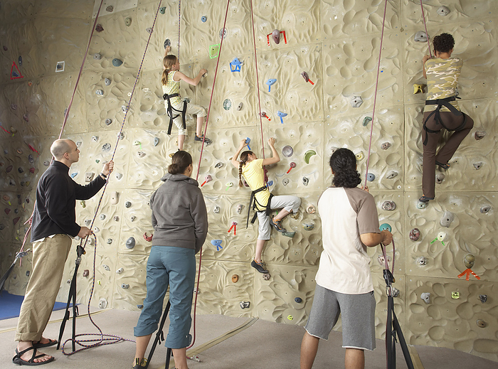 People in Climbing Gym, by Masterfile / Design Pics
