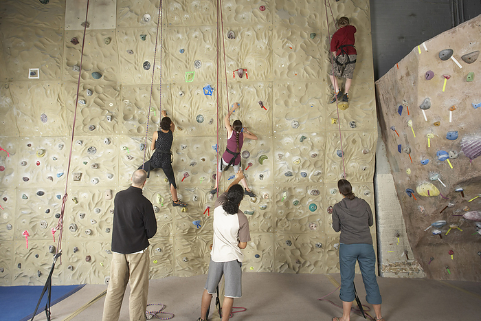 People in Climbing Gym, by Masterfile / Design Pics