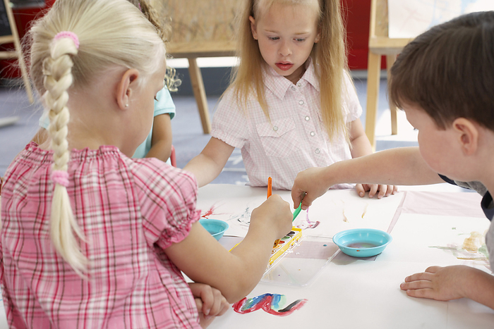 Children Painting at Daycare, by Masterfile / Design Pics
