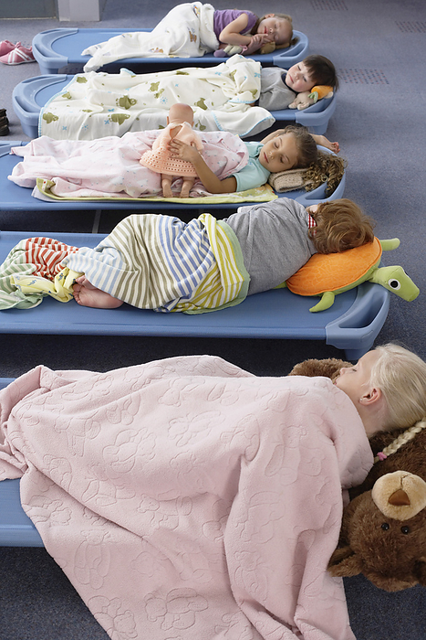 Children Sleeping in Day Care, by Masterfile / Design Pics