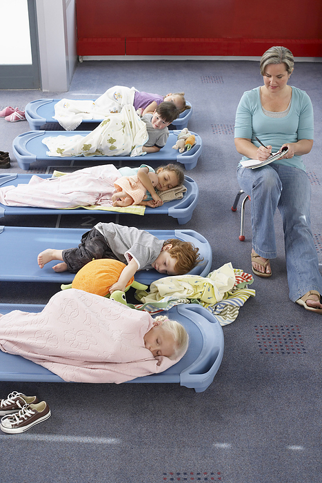 Children Sleeping in Day Care, by Masterfile / Design Pics