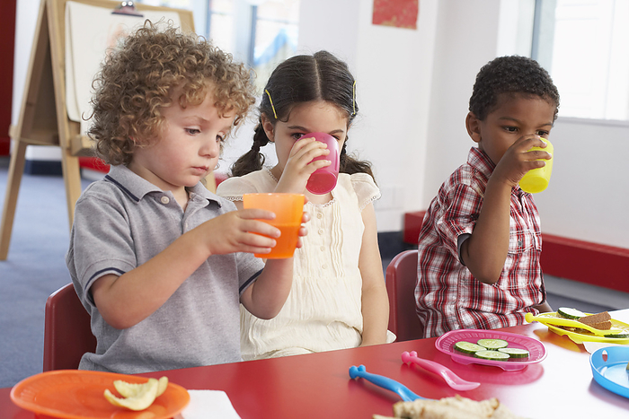 Children Eating at Daycare, by Masterfile / Design Pics