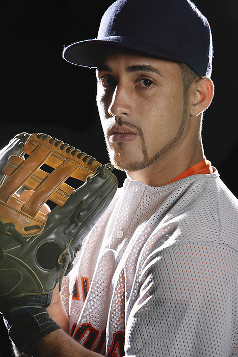 Portrait of Baseball Player, by Masterfile / Design Pics