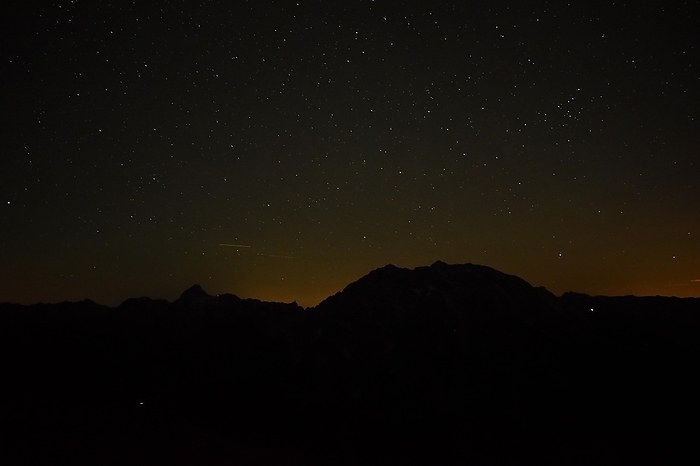 Silhouette of Watzmann and Großer Hundstod at night in Berchtesgaden National Park, Bavaria, Germany, Europe, by Christian Peters