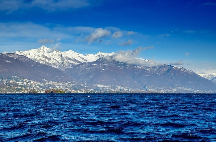 Alpine Lake Maggiore with Brissago Islands and Snow-capped Mountain in Ticino, Switzerland, Europe, by Mats Silvan