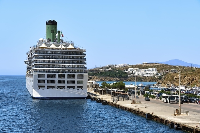 Big cruise liner moored to berth. Typical Greek island seascape. Bright summer day. Cars and buses waiting for tourists. Sea voyage, cruise ship adventures, Greek islands summer escape. Romantic holiday. Mykonos, Greece, Europe, by Natallia Pershaj
