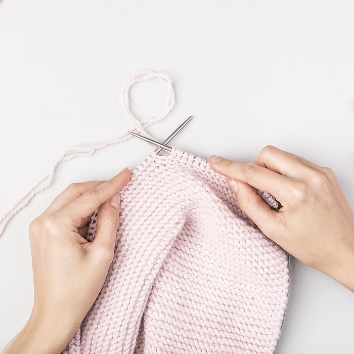 Top view woman knitting, by Oleksandr Latkun