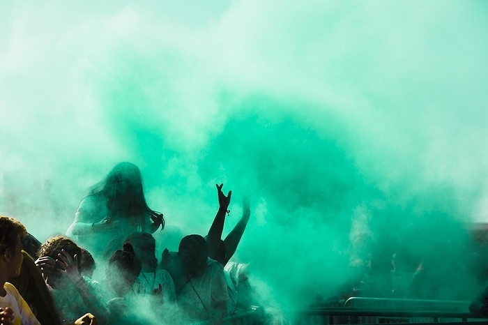 Green holi color powder crowd, by Oleksandr Latkun