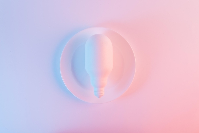 White light bulb plate against blue pink background, by Oleksandr Latkun