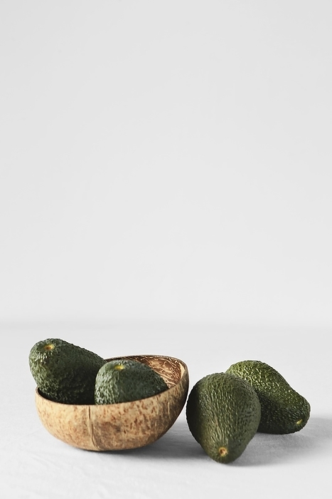 Abstract minimal concept avocados copy space, by Oleksandr Latkun
