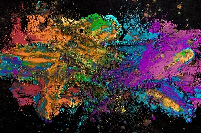 Explosion colored powder black surface, by Oleksandr Latkun