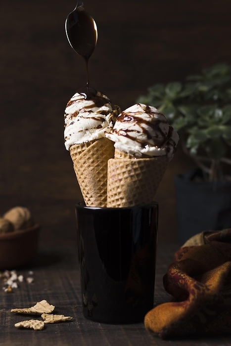 Delicious ice cream cones with caramel topping, by Oleksandr Latkun