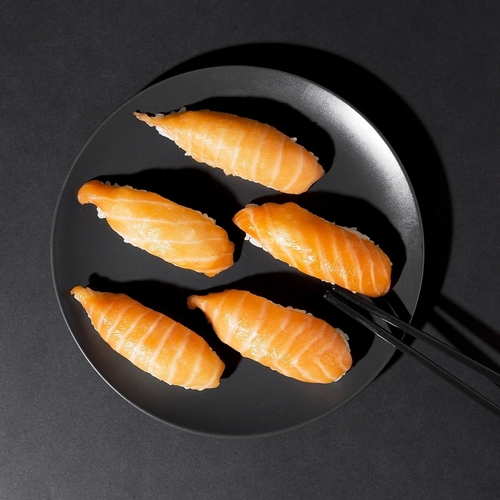 Plate with fresh variety sushi rolls, by Oleksandr Latkun
