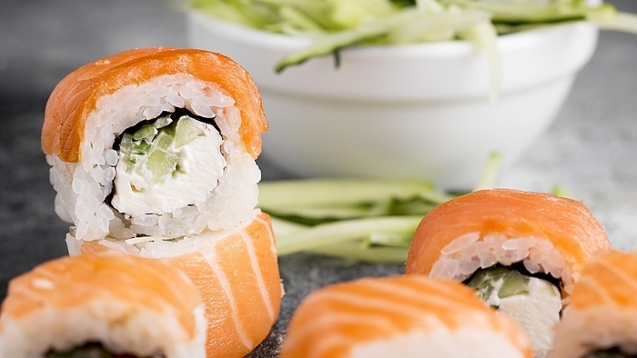 Salad fresh sushi rolls close up, by Oleksandr Latkun