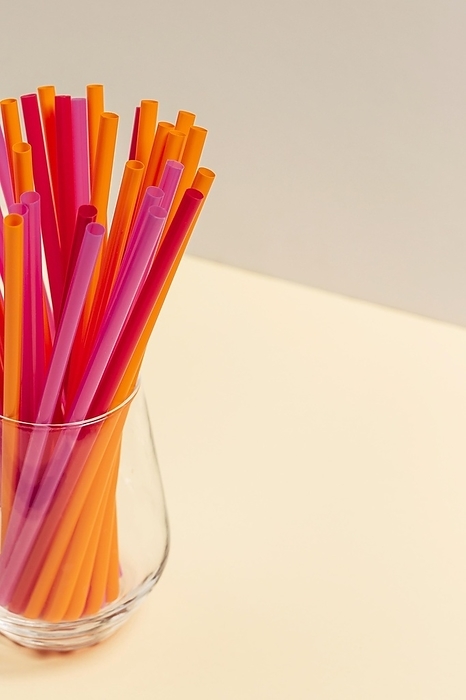 Colorful plastic straw collection glass, by Oleksandr Latkun