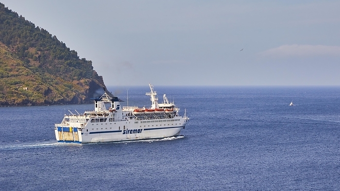Passing Siremar car ferry, cliffs, Lipari town, Lipari, Lipari Islands, Aeolian Islands, Sicily, Italy, Europe, by Ralf Adler