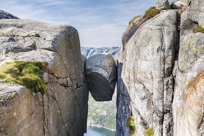 Kjeragbolten, trapped rock above the Lysefjord, Kjerag, Lysebotn, Rogaland, Norway, Europe, by Robert Haasmann