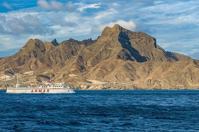Ferry in the sea, mountains in background. San Vincente. Mindelo. Cabo Verde. Africa, by Michael Runkel