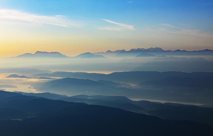 Mountain silhouette, mountains at dawn with a view of the Klagenfurt basin with Lake Lake Wörth and Karawanken, Gerlitzen, Gerlitzen Alpe, Nockberge, Gurktaler Alps, Carinthia, Austria, Europe, by Wolfgang Weinhäupl