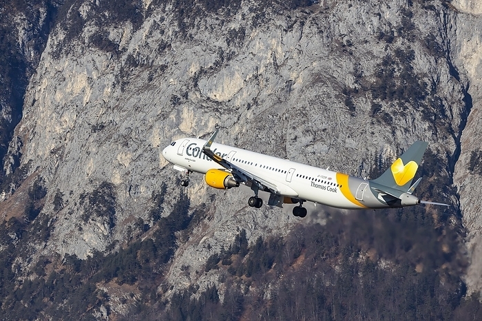 airbus Condor airline aircraft taking off from Innsbruck Kranebitten Airport, Airbus A321 200. Snow covered mountains of the Alps, Innsbruck, Tyrol, Austria, Europe, by Arnulf Hettrich