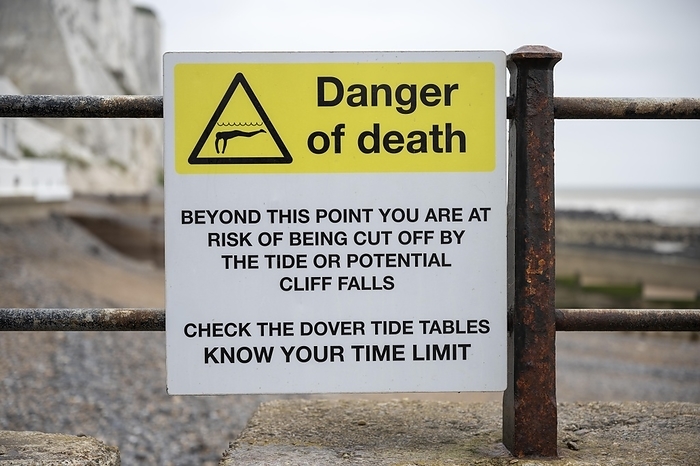 Sign for danger to life due to tidal currents or falls on the cliffs on the coast of St. Margarets Bay, English Channel, England, Great Britain, by Markus Keller