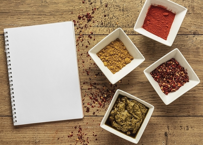 Top view food ingredients with notebook spices, by Oleksandr Latkun