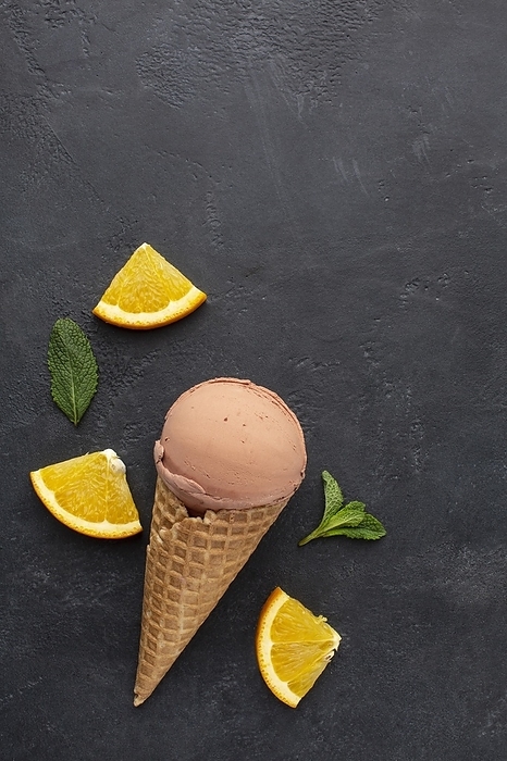 Top view ice cream cone with orange, by Oleksandr Latkun