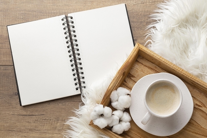 Top view notebook with cup coffee cotton flowers, by Oleksandr Latkun