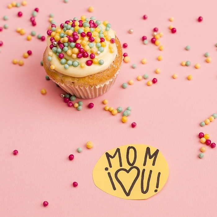 Mom i love you title paper near cupcake, by Oleksandr Latkun
