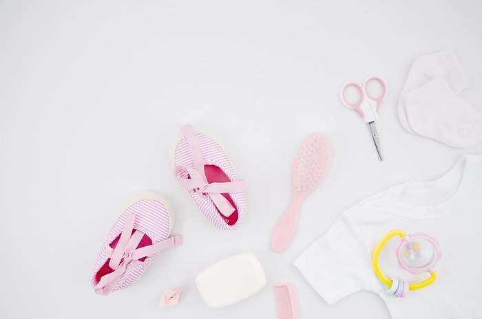 Top view baby shoes with bath accessories, by Oleksandr Latkun
