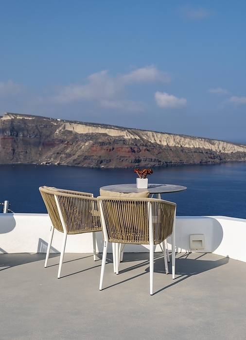 Greece Sea view from terrace with chairs and table, Ia, Oia, Santorini, Greece, Europe, by Petr Svarc
