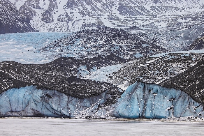 Iceland Glacier Fallj kull, Falljoekull in Austurland part of Vatnaj kull, largest ice cap in Iceland turns black due to the depositions of carbon and soot, by alimdi   Arterra