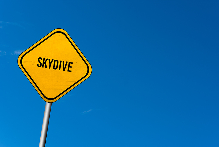 skydive   yellow sign with blue sky skydive   yellow sign with blue sky, by Zoonar Markus Beck