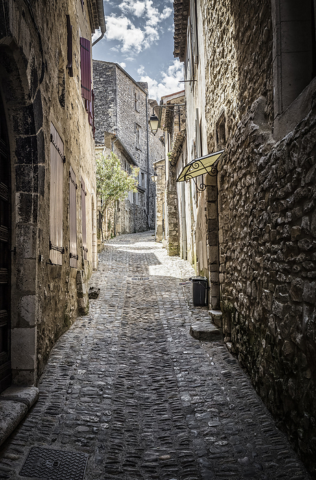 Typical alley in the village of Viviers, Ardeche, France Typical alley in the village of Viviers, Ardeche, France, by Zoonar Harald Biebel