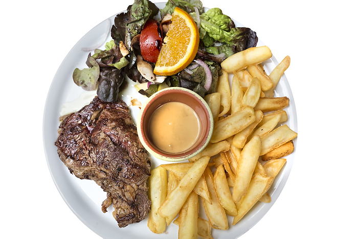 Entrecote with chips and salad Entrecote with chips and salad, by Zoonar Harald Biebel