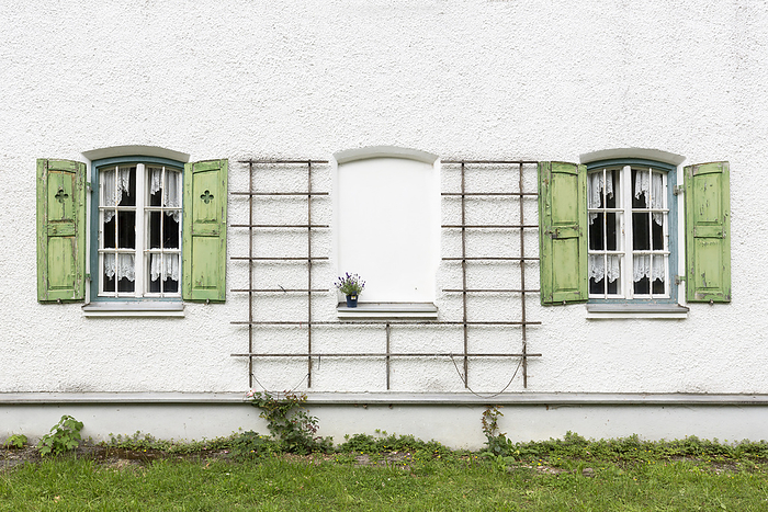Two windows with windows on an old house Two windows with windows on an old house, by Zoonar Harald Biebel