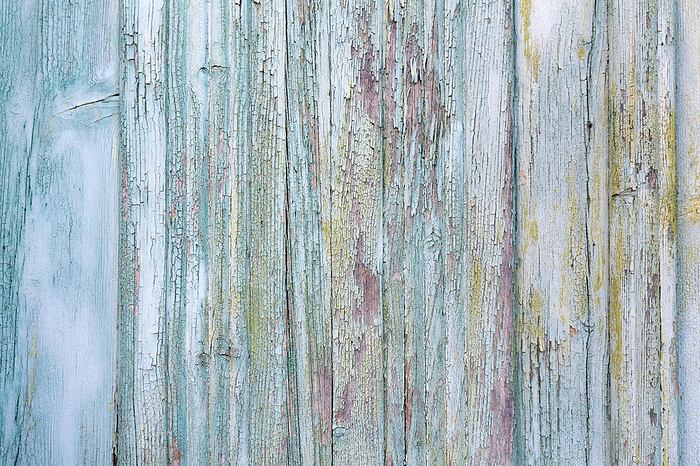Wooden planks with peeling paint as background Wooden planks with peeling paint as background, by Zoonar Harald Biebel