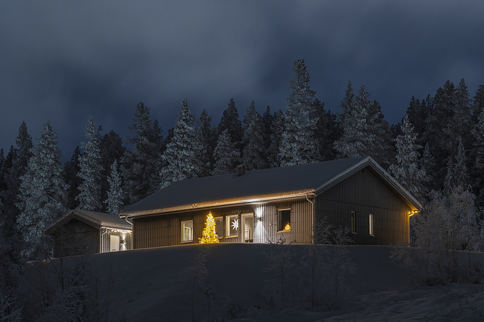 snow covered house at night, Gaellivare, Norrbotten, Lapland, Sweden snow covered house at night, Gaellivare, Norrbotten, Lapland, Sweden, by Zoonar GUNAR STREU