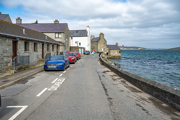 Disabled parking spot at a street near the sea at Shetland Island, Scotland Disabled parking spot at a street near the sea at Shetland Island, Scotland, by Zoonar Markus Beck