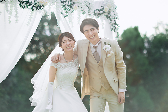 Smiling Japanese bride and groom