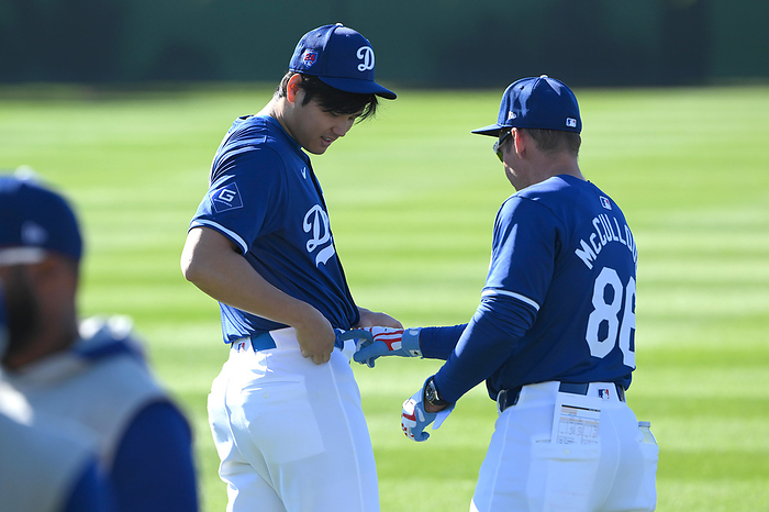 2024 MLB Camp February 16, 2024 Dodgers Camp Day 8 Shohei Ohtani  left  talks with Coach Clayton McCullough  right  Location Camelback Ranch, Arizona