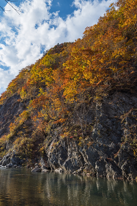 Kappa-fuchi and autumn leaves along the Toyohira River in Jozankei, Minami-ku, Sapporo, Hokkaido, Japan