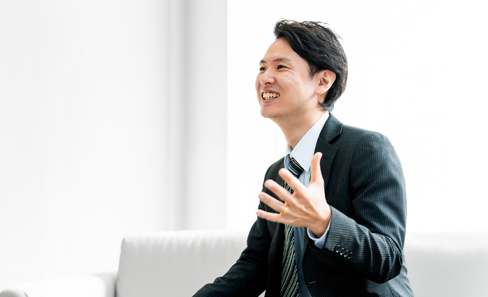 Smiling Japanese male businessman (People)