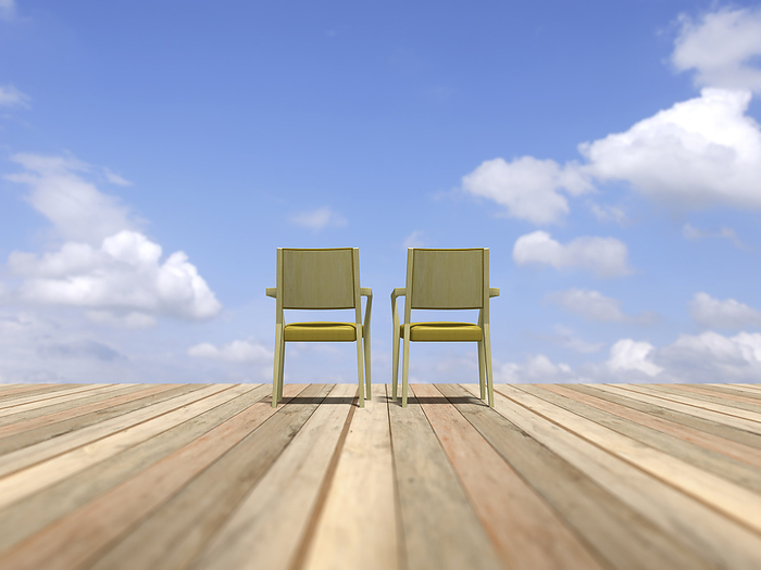 Chairs lined up on a wooden deck and blue sky