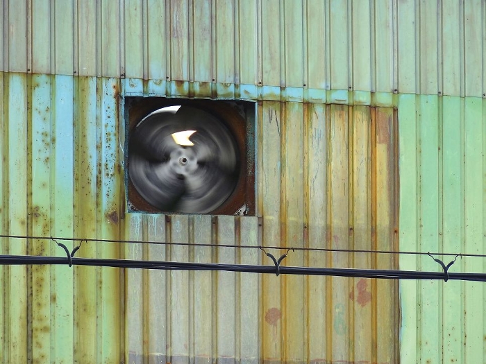 Ventilation fan in a tin-clad factory