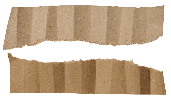 Piece of brown paper with torn edges isolated on background, close up Piece of brown paper with torn edges isolated on background, close up