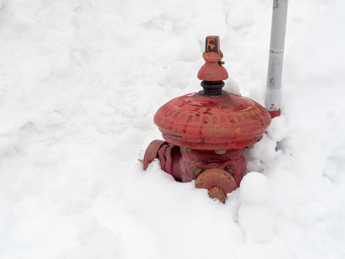 Snow accumulation and above-ground fire hydrants. (Otaru City, Hokkaido)